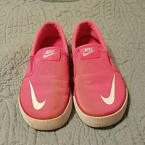 Pink used nike slip on sneakers
